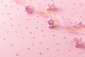 Pink background with candy hearts sweet flowers and ribbon for Valentine day, wedding