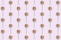 pink background of candy lollipop sweet with stick, delicious and fun food with colorful sugar Royalty Free Stock Photo