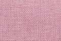 Pink background with checkered pattern, closeup. Structure of the fabric macro. Royalty Free Stock Photo