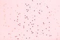 Pink background with red star glitter. Royalty Free Stock Photo
