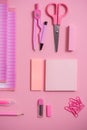 On a pink background, school accessories and a pen, colored pencils, a pair of compasses, a pair of compasses, Copy space, top vie