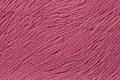 Pink background from soft textile material. Fabric with natural texture. Royalty Free Stock Photo