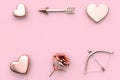 pink background valentine concept 3d render abstract metallic heart flower bow and arrow Royalty Free Stock Photo