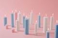 a pink background with white and blue candles Royalty Free Stock Photo