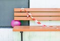 Pink balloon in an orange bench