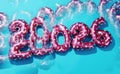 pink 2026 balloons with a kaleidoscopic effect Royalty Free Stock Photo