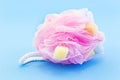 Pink Bath Puff on Blue Royalty Free Stock Photo