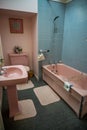 Pink bathdroom indoors at Skaill House museum, Orkney Island, Scotland, vertical shot Royalty Free Stock Photo