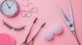Beauty Routine Flat Lay Mascara Wands, False Lashes, Scissors, Clock, Sponges on Pink Royalty Free Stock Photo