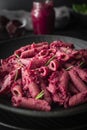 Pink beetroot pesto pasta with rosemary Royalty Free Stock Photo