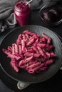 Pink beetroot pesto pasta with rosemary Royalty Free Stock Photo