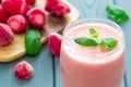 Pink Berry Smoothie with Frozen Strawberries and Mint Royalty Free Stock Photo