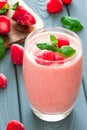 Pink Berry Smoothie with Frozen Strawberries and Mint Royalty Free Stock Photo