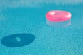 Pink big float on pool Royalty Free Stock Photo