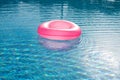 Pink big float on pool Royalty Free Stock Photo