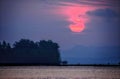 pink big sun rising above the sea Royalty Free Stock Photo