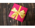 Pink Birthday present box on wooden background. Season`s  gifts for women and girls. Merry Christmas and Happy New Year holidays Royalty Free Stock Photo