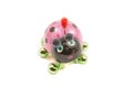 PInk, Black, and green toy ladybug.