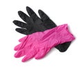 Pink and black latex gloves isolated on a white background