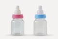 Pink and blue baby bottles - Male or female? Concept of future baby gender Royalty Free Stock Photo