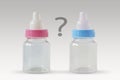 Pink and blue baby bottles with question mark - Male or female? Concept of future baby gender Royalty Free Stock Photo