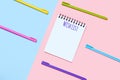 Pink and blue background with notebook and Wishlist text