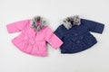 Pink and blue children's winter jackets. For girl and boy