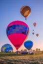 The pink and blue hot air balloons in the sky of SAINT EMILION for the Montgolfiades 2021