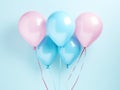 a pink and blue pink and blue balloon has four hearts on it