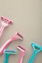 Pink and blue razors on grey background close up Royalty Free Stock Photo