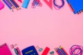 Pink and blue school supplies double border over a pink background Royalty Free Stock Photo