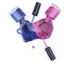 Pink and Blue Spilled Nail Polish on White Royalty Free Stock Photo