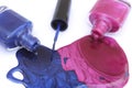 Pink and Blue Spilled Nail Polish on White Royalty Free Stock Photo