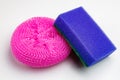 Pink and blue sponge is on a white background Royalty Free Stock Photo