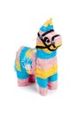 Pink, blue and yellow burro pinata on white