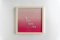 Pink Board Words That Spell Ik Hou Van Jou (translation: I love you), on a white background, horizontal