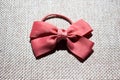 Pink bow for the girl.