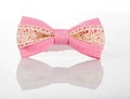 Pink bow tie with white lace Royalty Free Stock Photo