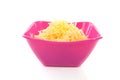 Pink bowl with grated cheese