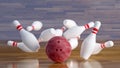 Bowling ball number 16 smashing pins Royalty Free Stock Photo