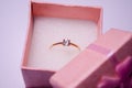 Pink box with a ring. Golden ring with a stone. Pink jewelry box. Ring for a gift. Bijouterie. Jewelry for girls. Jewelry Royalty Free Stock Photo