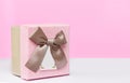 Pink box on the table, festive background Royalty Free Stock Photo