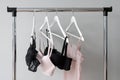 Vareity of bra hanging on a hanger. Textile, Underwear. Female bra in lingerie underwear store. Advertise, sale, fashion Royalty Free Stock Photo