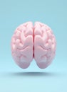A pink brain model is depicted floating on a blue surface, accompanied by a white brain model set against a blue Royalty Free Stock Photo