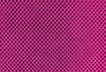 Pink breathable porous poriferous material for air ventilation with holes. Sportswear material nylon texture