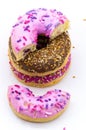 Pink and brown doughnut, chocolate and berry doughnut, strawberry and raspberry doughnuts, walnut donut on a white background