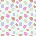 Pink, brown and violet easter eggs with dots on pastel green background seamless pattern