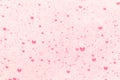 Pink bubbles on the surface of the water. Background for cosmetics, hygiene and washing