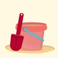 Pink bucket with sand and red shovel isolated Royalty Free Stock Photo