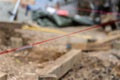 Pink builders string-line closeup on constructions site in selective focus Royalty Free Stock Photo